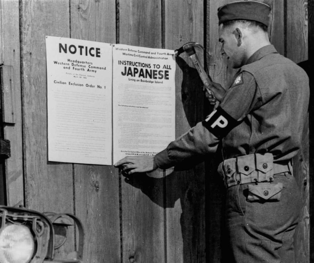 soldier hanging exclusion order sign